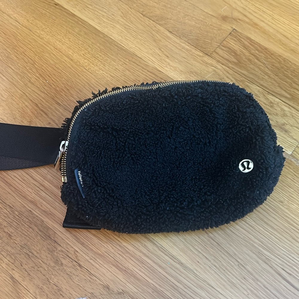 Lululemon belt bag black with gold details